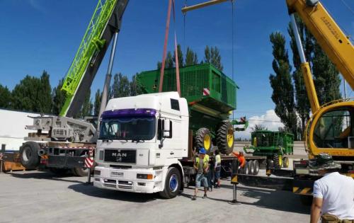 Uni-Home with International Trucking of Cotton Pickers