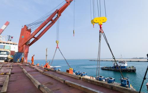 Sealand Shipping Triumph with Seamless Barge Load