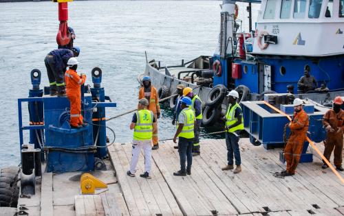 Sealand Shipping Triumph with Seamless Barge Load