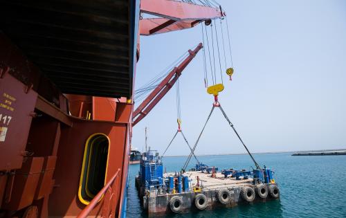 Sealand Shipping Triumph with Seamless Barge Load